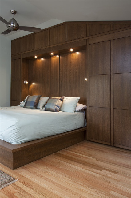Built In Bedroom Cabinetry
 Bedwall with Built in cabinet surround & hidden door