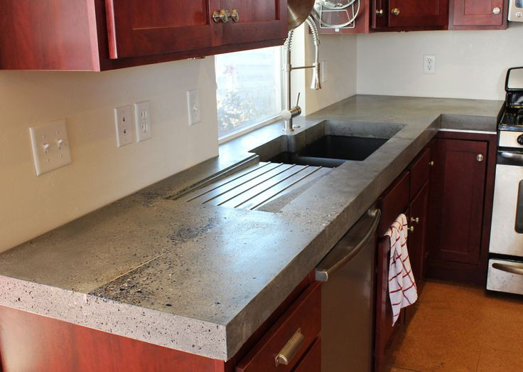 Concrete Kitchen Countertops Cost
 We replaced the boring laminate countertops with these two