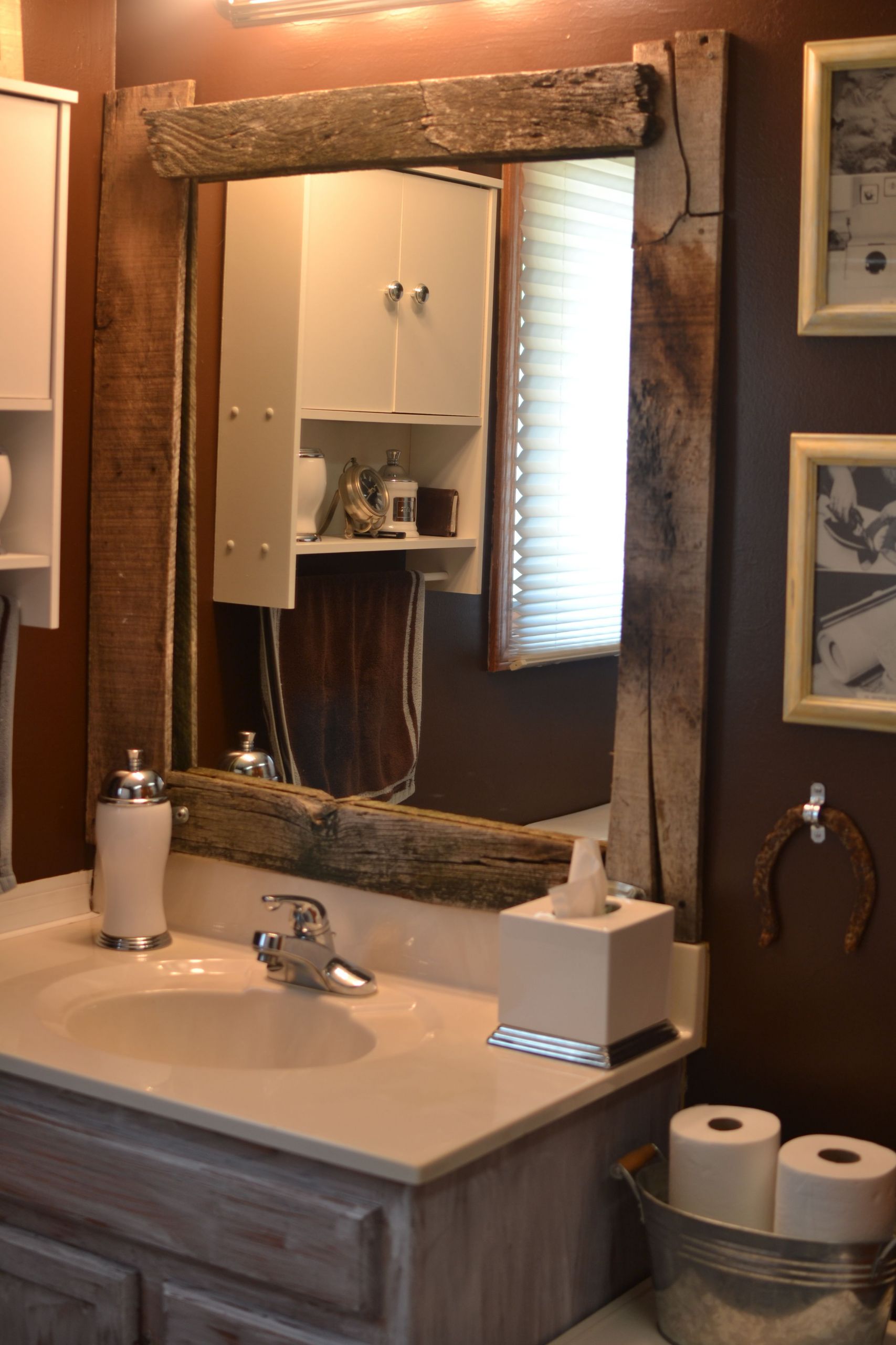 Framed Bathroom Mirror Ideas
 DIY barn wood framed mirror I d love to re trim and re