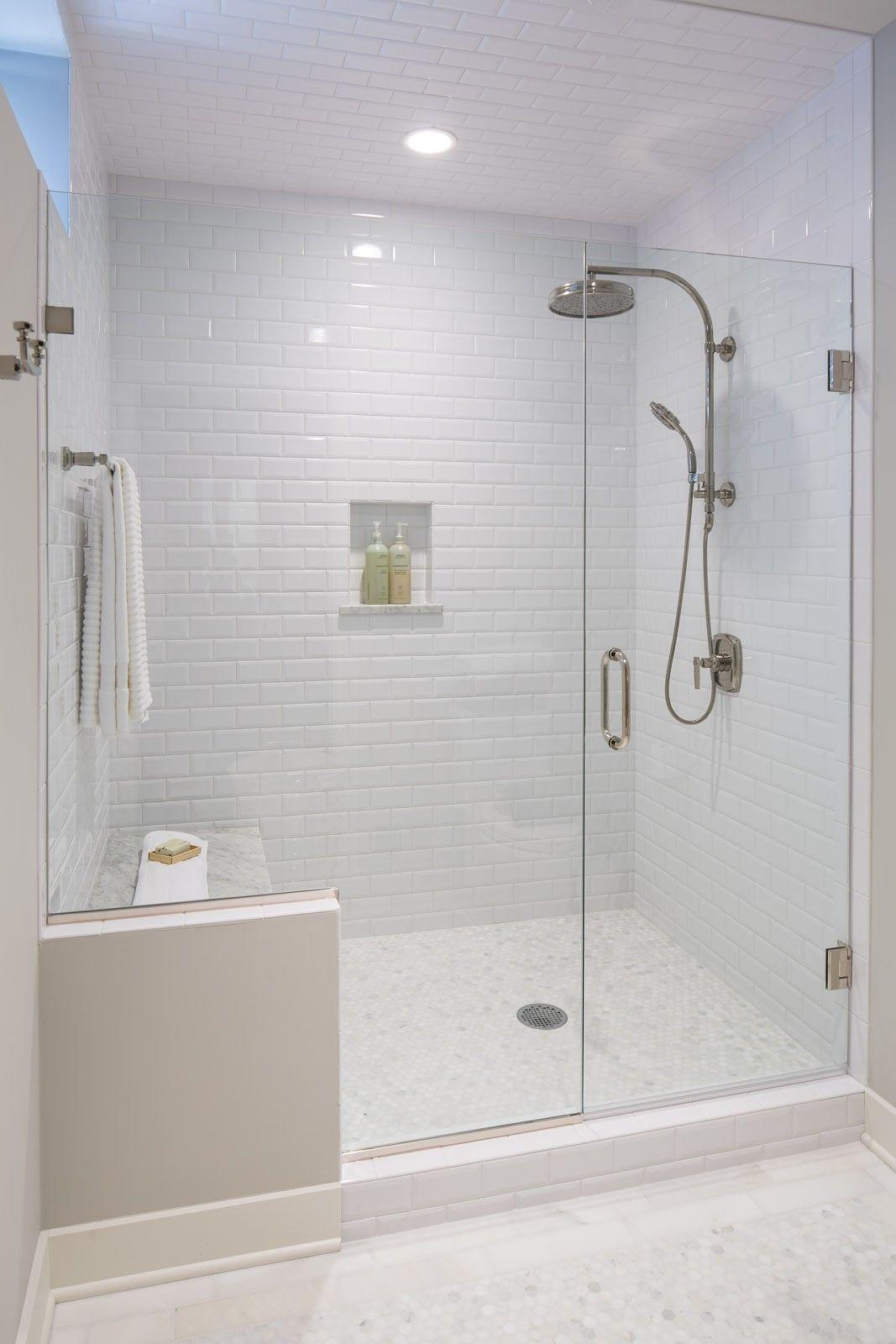White Tile Bathroom Shower
 All white bathroom with subway tile even on the ceiling