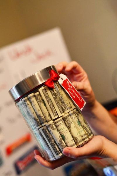 50Th Birthday Gift Ideas For Women
 Fifty one dollars bills rolled up and stacked inside a