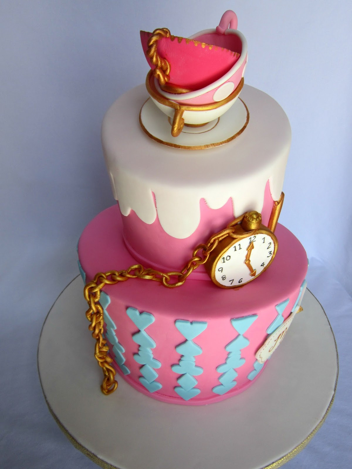 Alice In Wonderland Birthday Cake
 Delectable Cakes "Alice in Wonderland" Teacup Birthday Cake