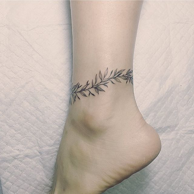Anklet Tattoo
 We re definitely into this delicate leaf ankle tattoo