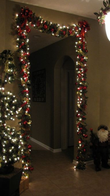 Apartment Patio Christmas Decorating Ideas
 I love doing this over doors Beautiful Entry way to