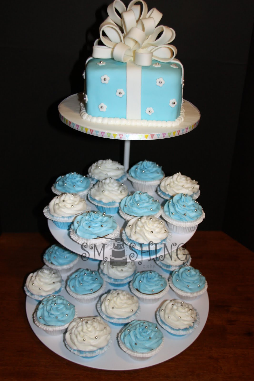 Baby Shower Cakes Recipes
 Smashing Cake Designs Blue and white baby shower cupcake