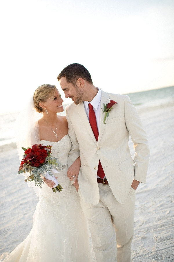 Beach Wedding Groom Attire
 Picture a creamy suit a white shirt a red tie and a