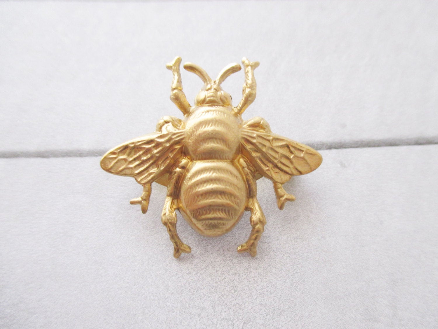 Bee Brooches
 Bee brooch gold BumbleBee pin Bumble Bee lapel pin Brass bug