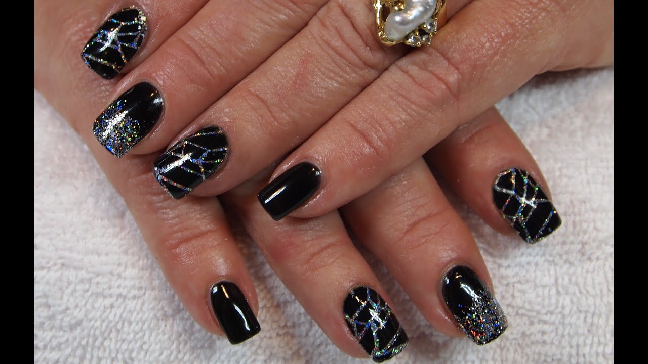 Black And Glitter Nail Designs
 Stunning Black Gel Nails with Holo Silver Glitter