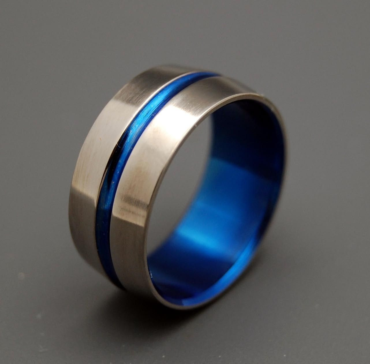 Blue Wedding Bands For Him
 Love should be so simple Our Signature Ring features a