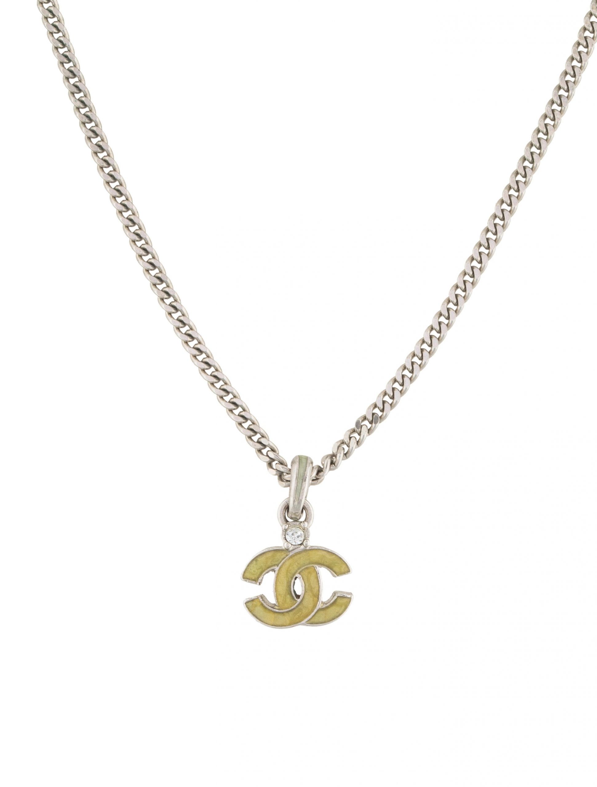 Chanel Pendant Necklace
 Chanel CC Logo Enamel & Crystal Pendant Necklace