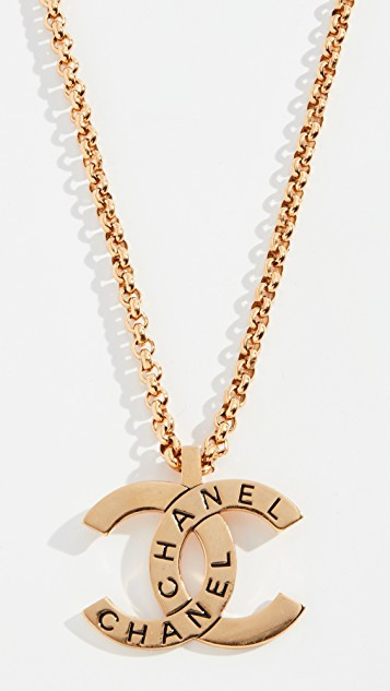 Chanel Pendant Necklace
 What Goes Around es Around Chanel Gold CC Pendant
