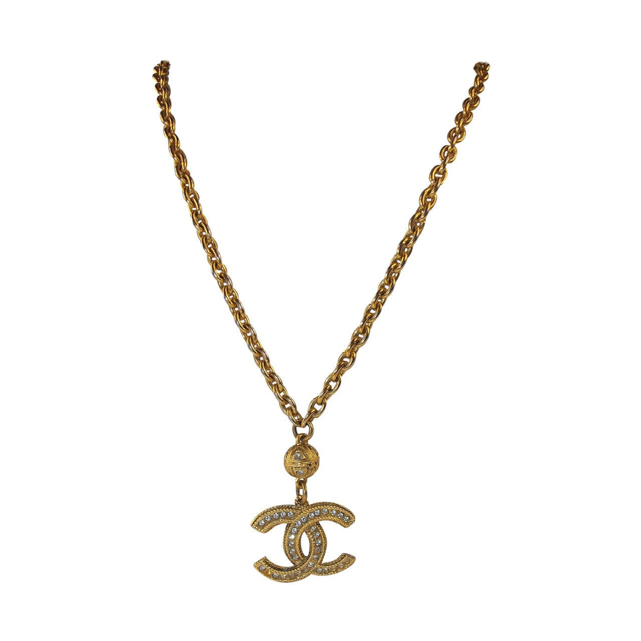Chanel Pendant Necklace
 Chanel Necklace with Crystal Logo Pendant For Sale at 1stdibs