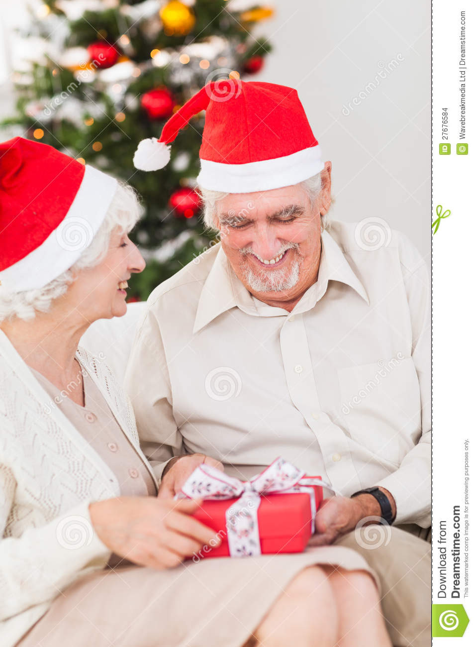 Christmas Gift Ideas For Older Couples
 Elderly Couple Swapping Christmas Presents Stock
