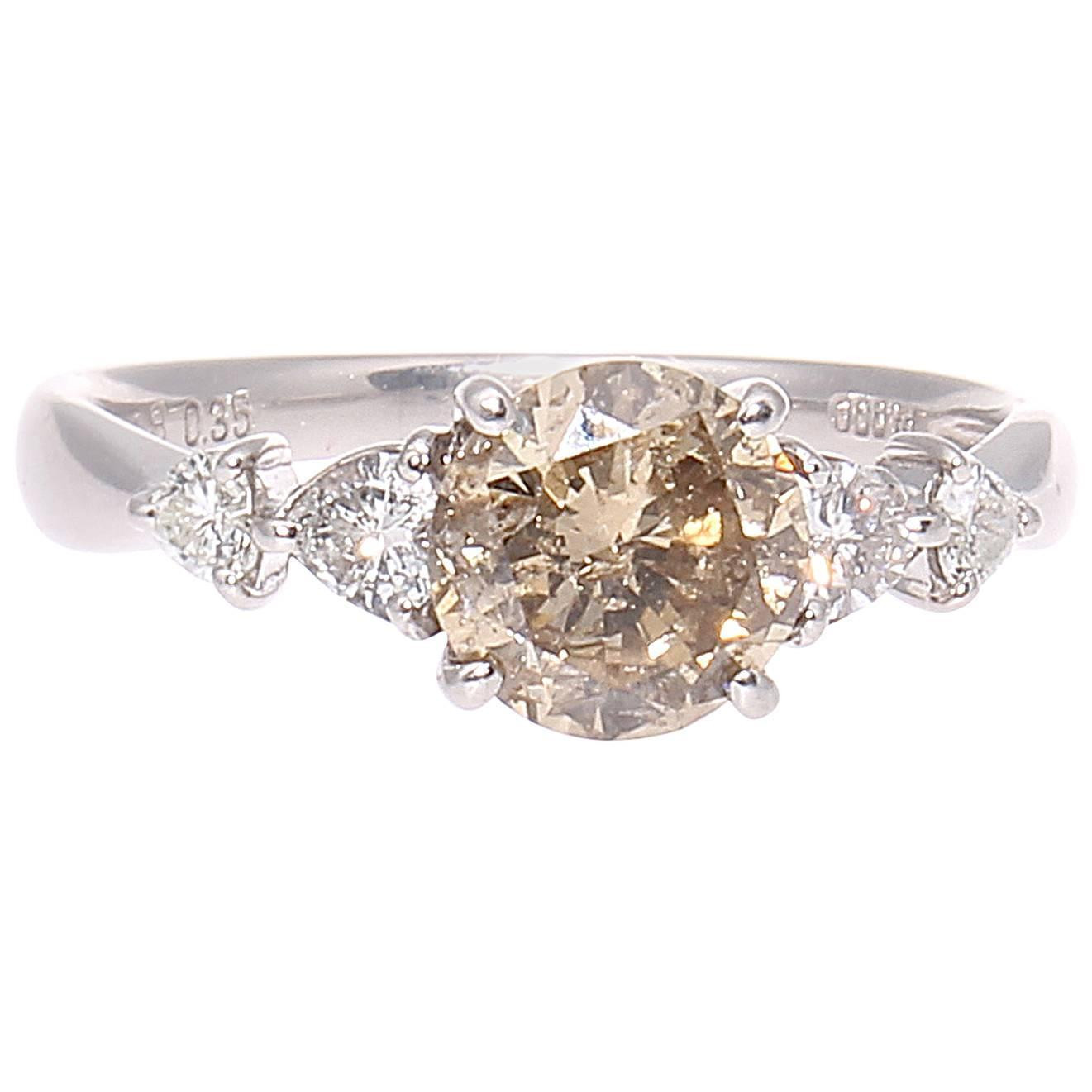 Colored Diamond Engagement Rings
 Light Champagne Colored Diamond Platinum Engagement Ring