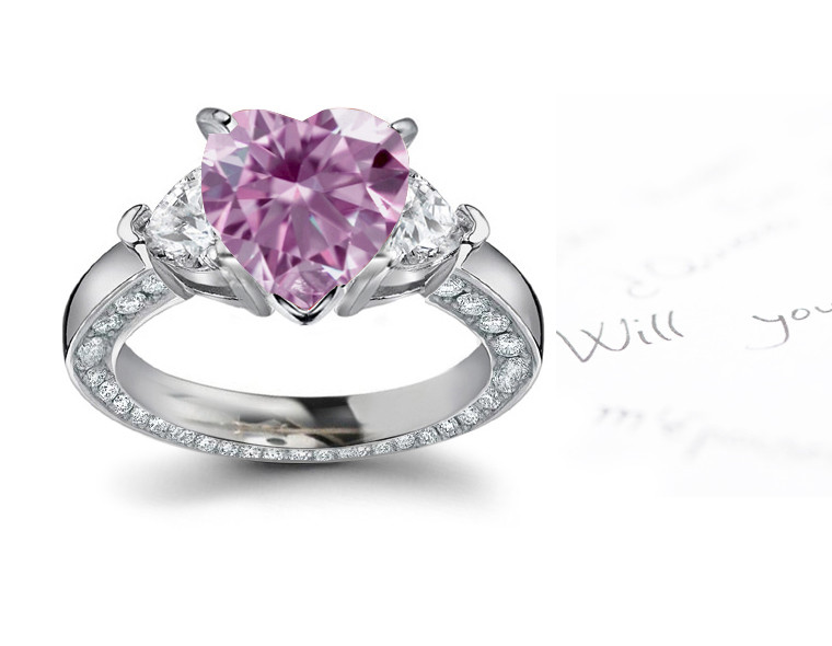Colored Diamond Engagement Rings
 Purple Tanzanite and Diamond Halo Ring in Platinum at