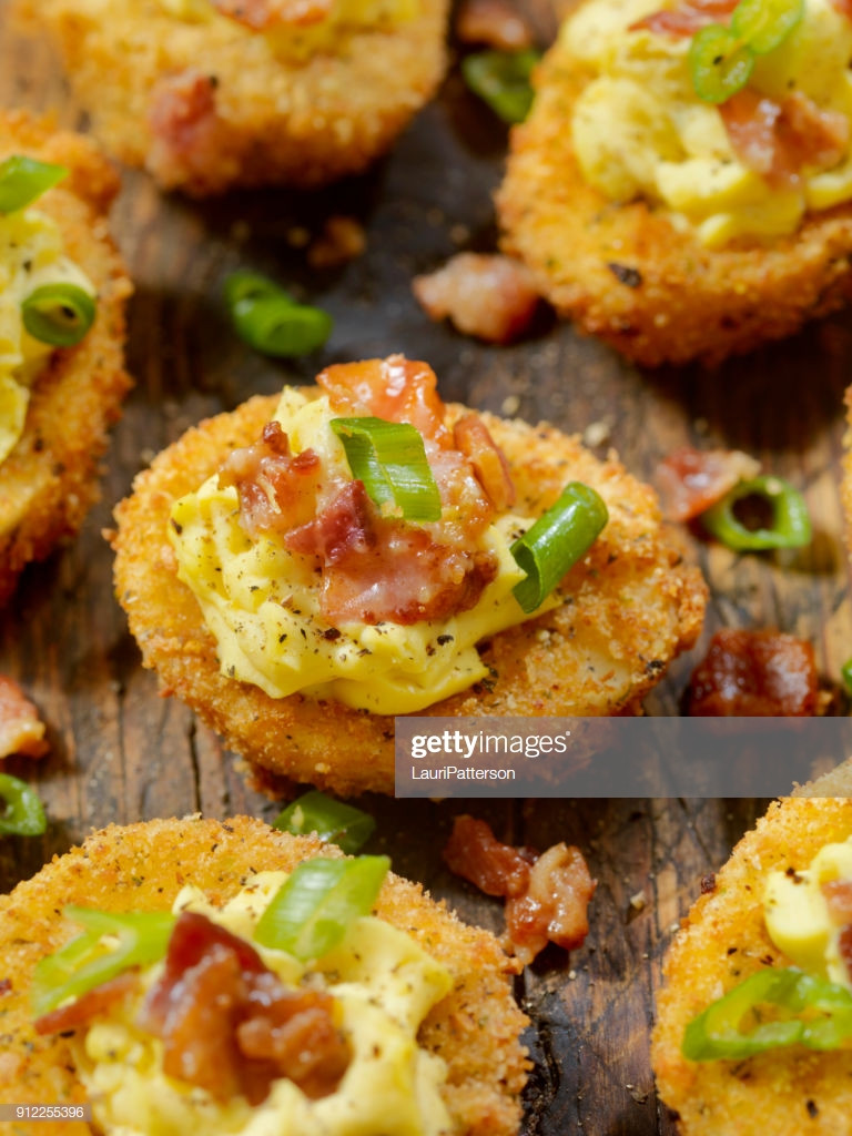 Deep Fried Deviled Eggs With Bacon
 Deep Fried Deviled Eggs With Bacon And Green ions Stock