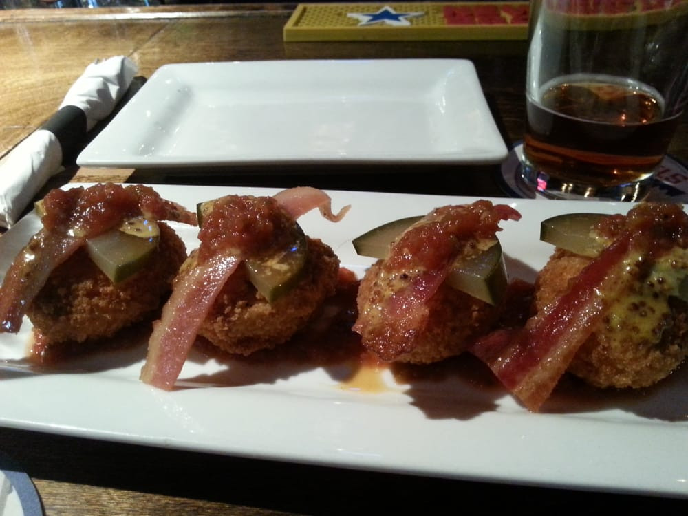 Deep Fried Deviled Eggs With Bacon
 Deep fried deviled eggs with homemade pickled cucumbers