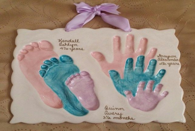 DIY Baby Handprints
 Sibling foot and handprints in clay