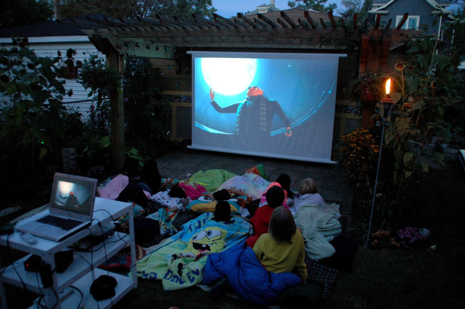 DIY Outdoor Projector Screen
 Our Tiny Oak Park Bungalow DIY Outdoor Movie Screen