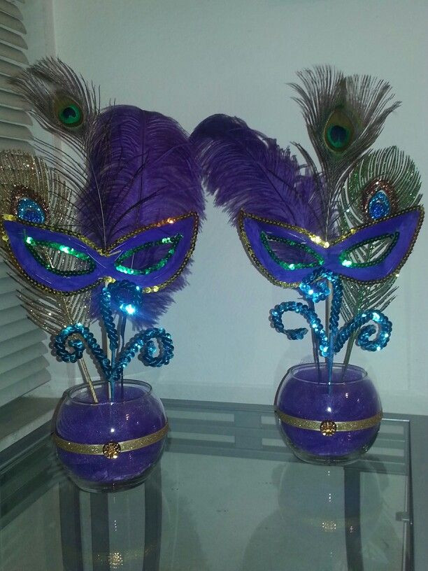 DIY Peacock Party Decorations
 Mardi Gras peacock centerpiece I made for a baby shower