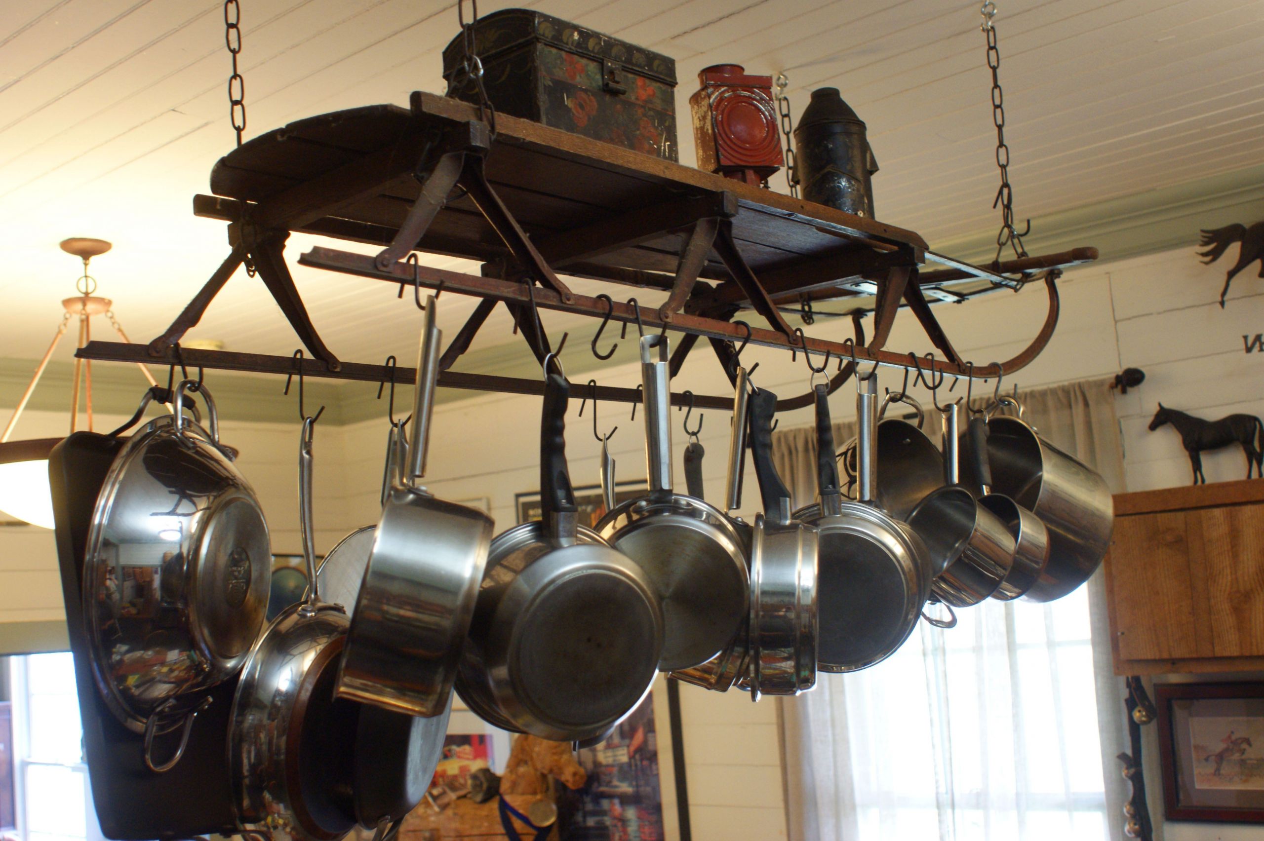 DIY Pots And Pans Rack
 pot racks made from farm equipment Google Search