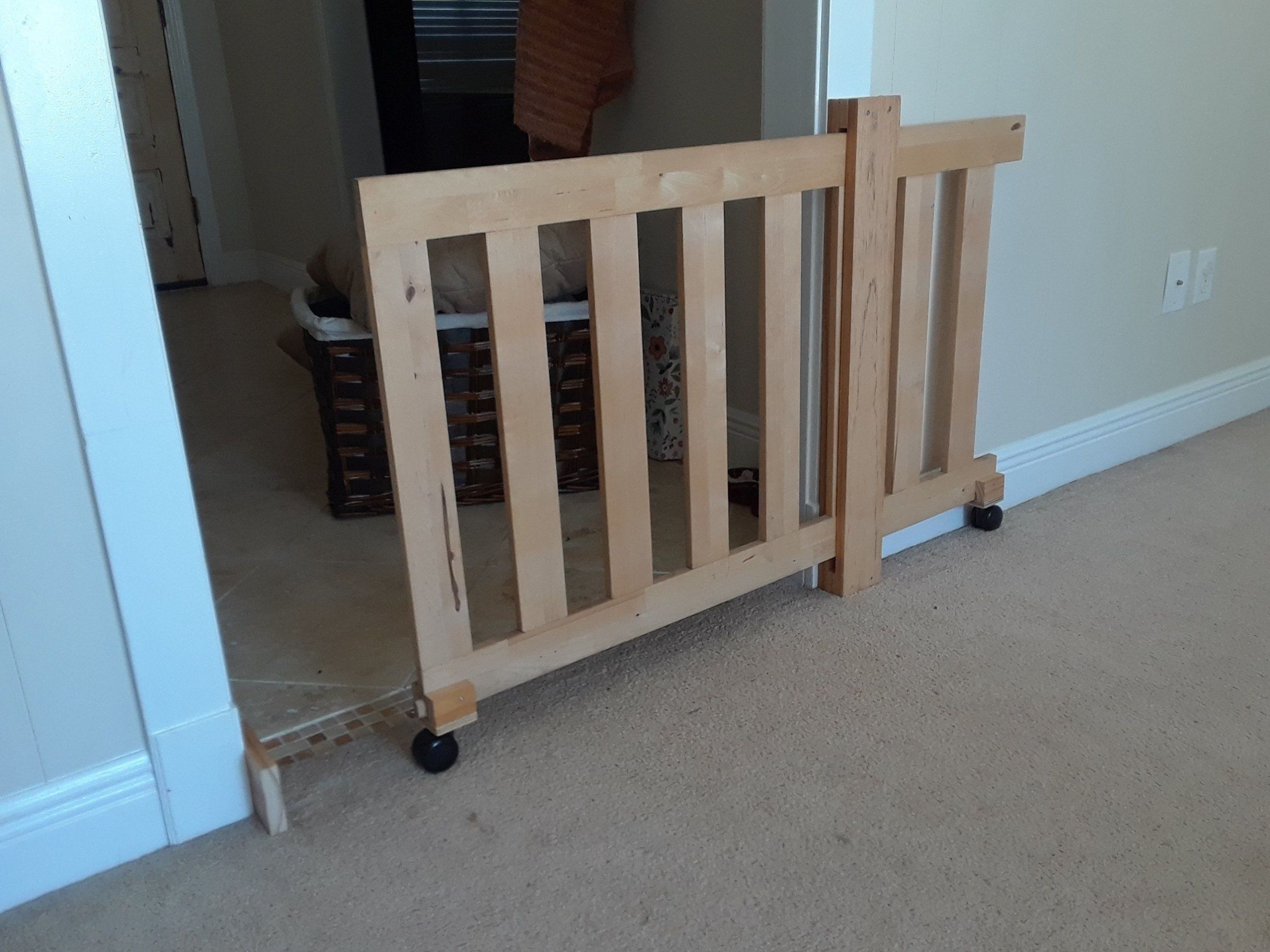 DIY Sliding Baby Gate
 Diy dog gate from futon frame and garage spare materials