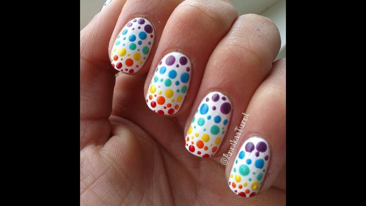 Dots Nail Art
 Colorful polka dots nail art