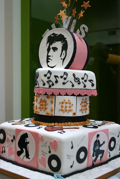 Elvis Birthday Cake
 3 tier pink and white Elvis theme birthday cake JPG