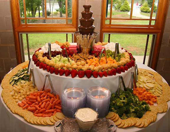Engagement Party Catering Ideas
 love how the veggies chocolate fountain displayed