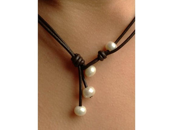 Freshwater Pearl Leather Necklace
 Freshwater pearl necklaceleather and pearls by Carolinelenox