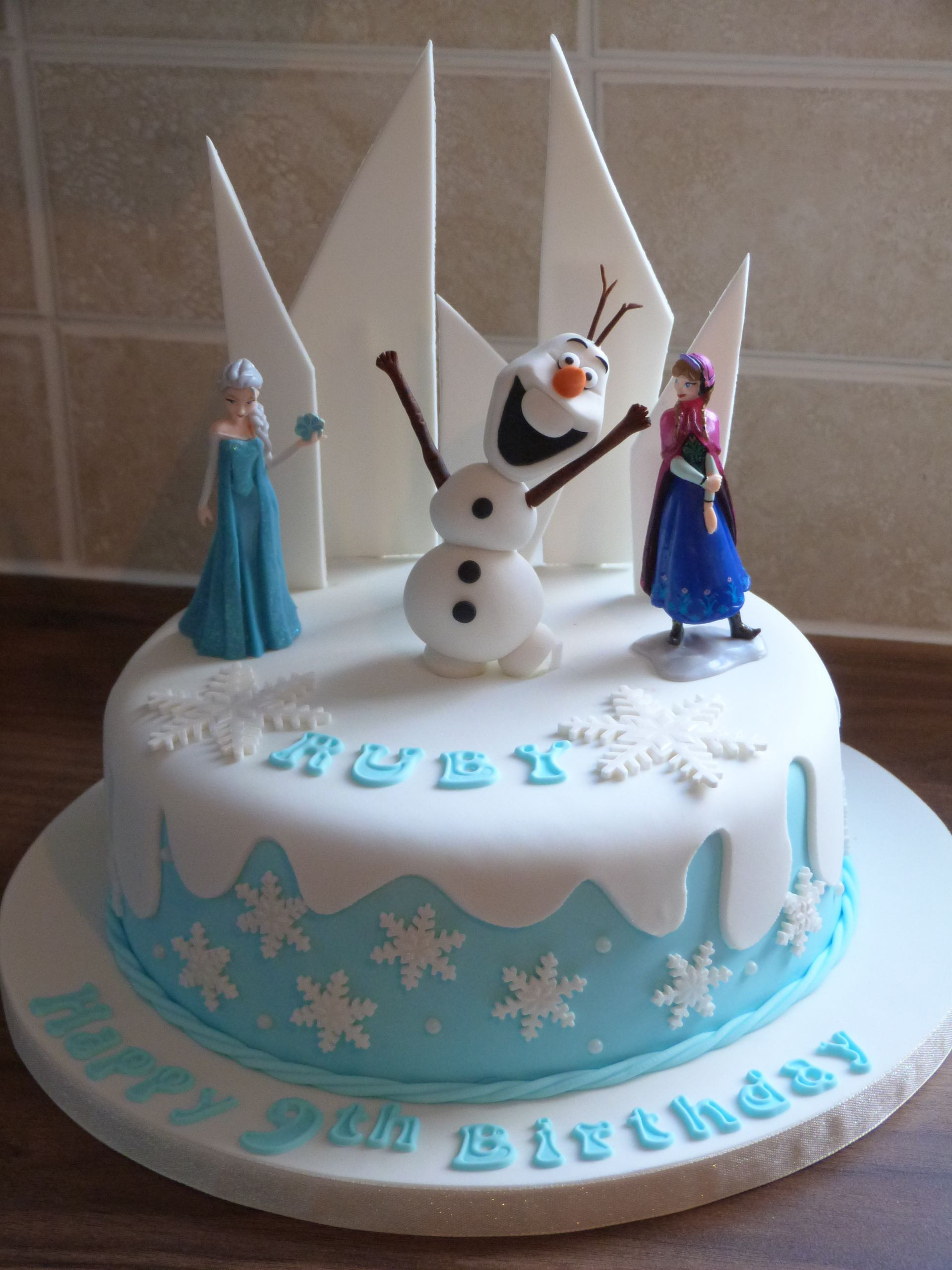 Frozen Birthday Cake Ideas
 Frozen themed cake with a hand made Olaf