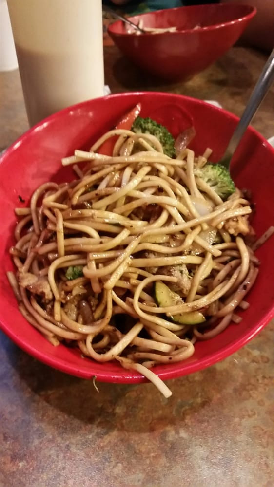 Genghis Grill Sauces
 Medium bowl with chicken beef broccoli zucchini onions