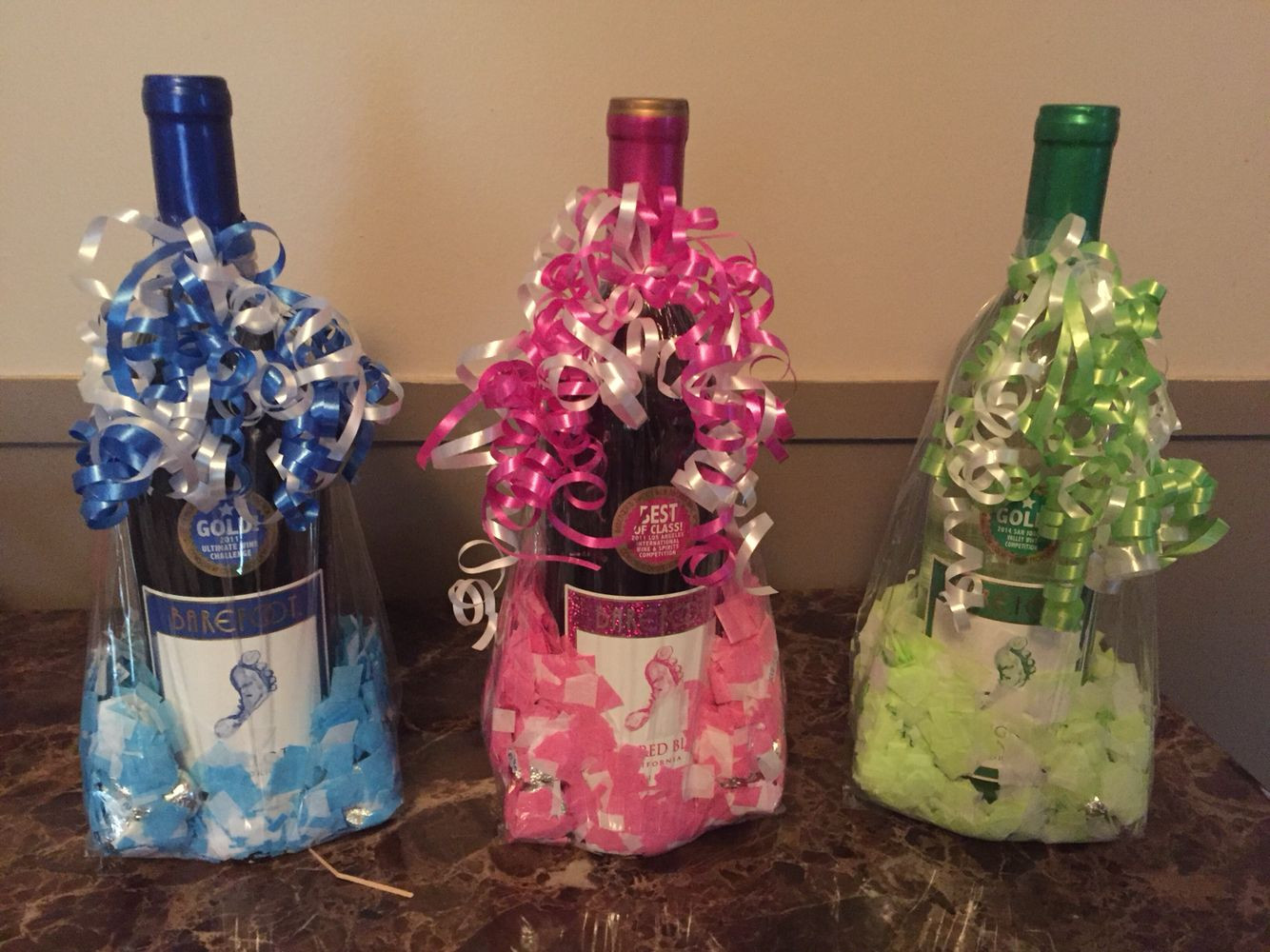Gifts Ideas For Baby Shower Games
 Barefoot wine in t treat bag with confetti and
