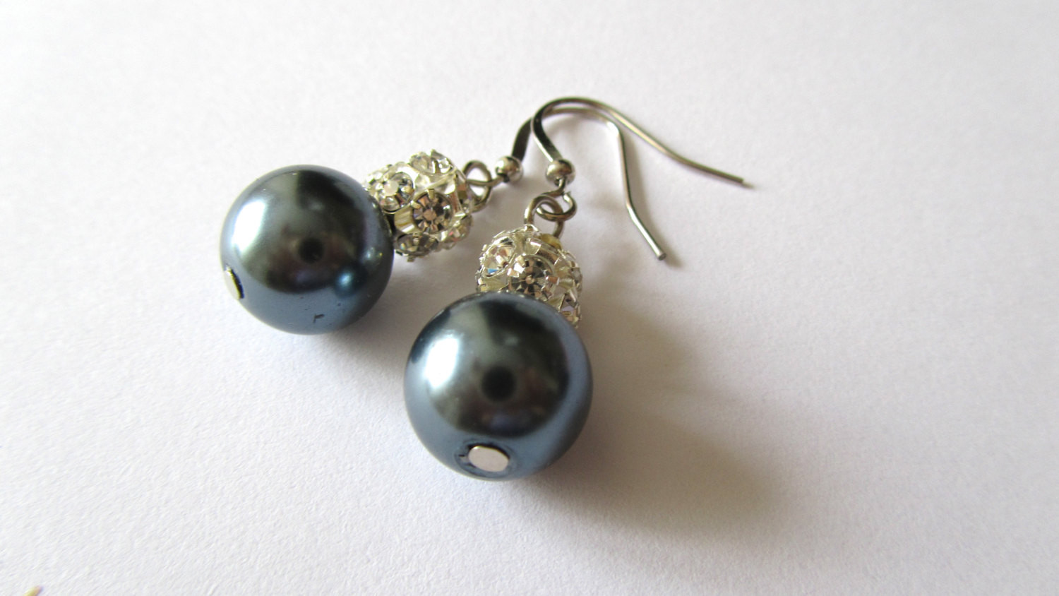 Gray Pearl Earrings
 Dark gray pearl earrings with ball rhinestone by BridalStore
