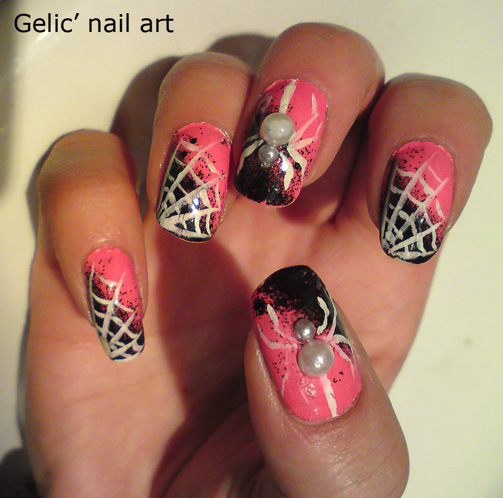 Halloween Nail Ideas
 Gelic nail art Halloween white spider nail art in pink