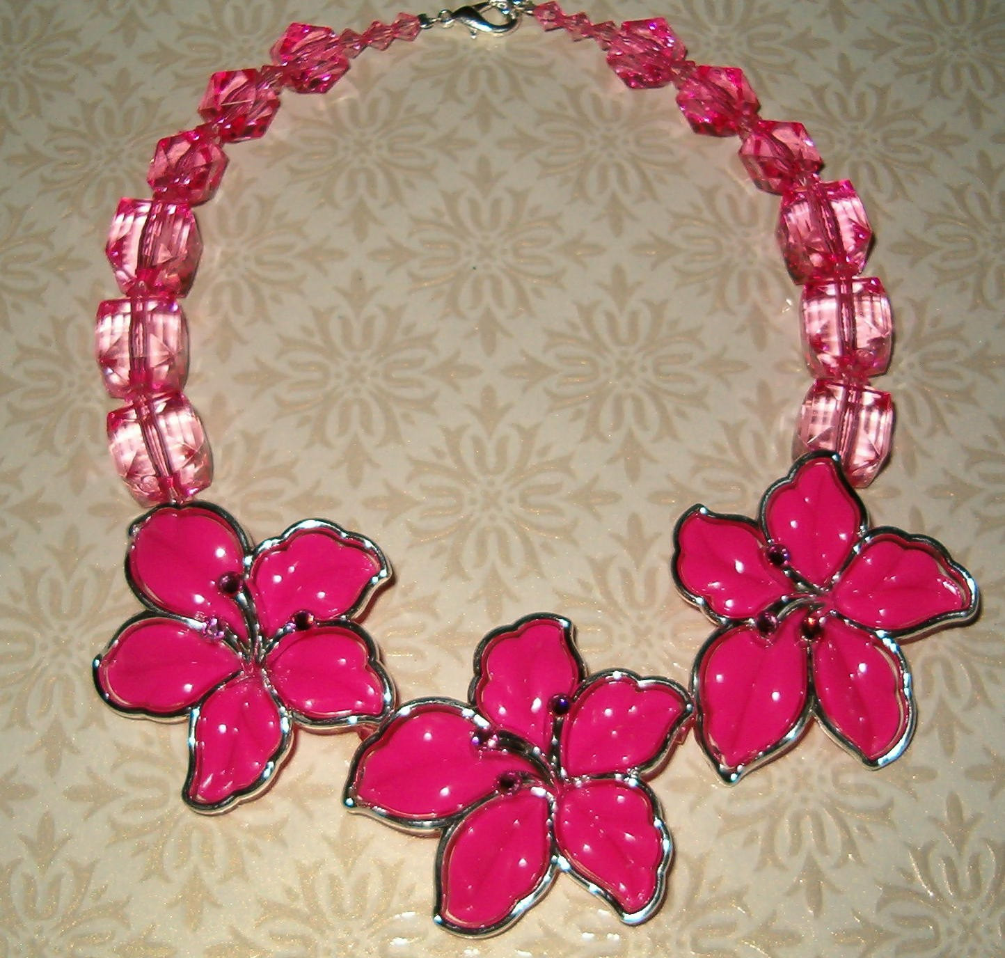 Hawaiian Flower Necklace
 Pink Hawaiian Flower Trio Necklace by kathyskreations1 on Etsy