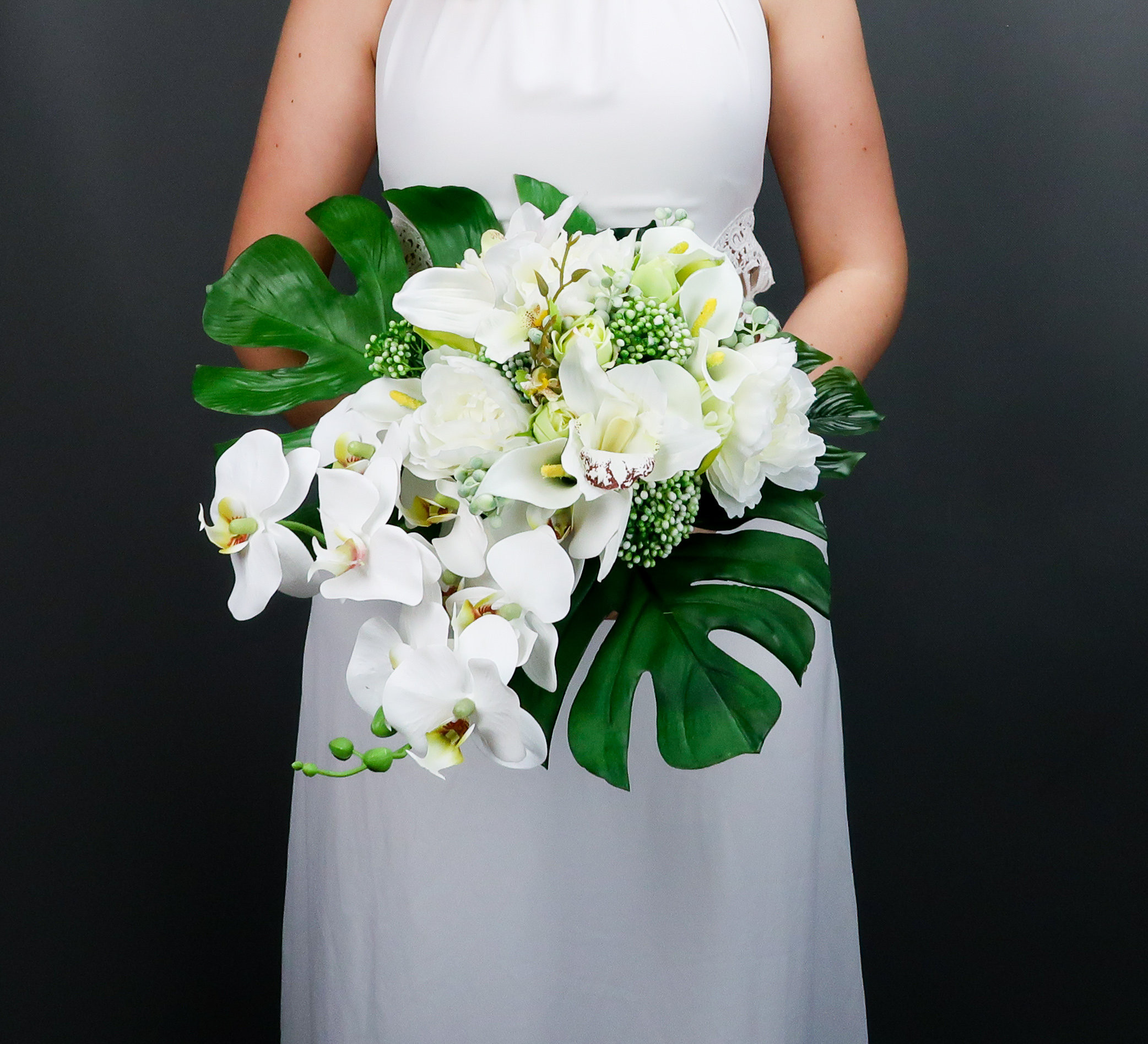 Hawaiian Wedding Flowers
 Tropical wedding bouquet with white orchids and greenery