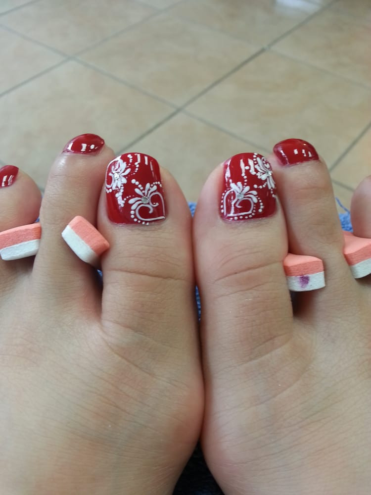 Heart Nail Designs For Short Nails
 Cute heart design on hot red toe nails Yelp