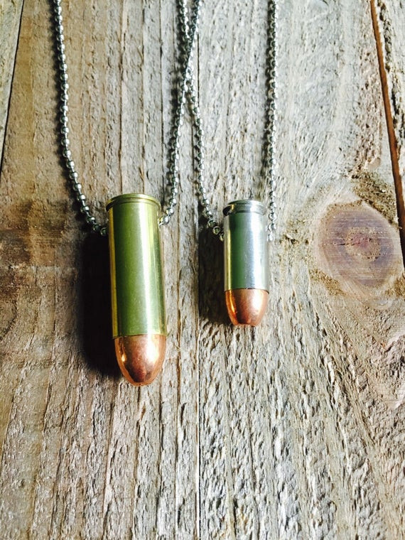 His And Hers Bullet Necklaces
 Couples bullet necklaces brass colt 45 his and hers bullet
