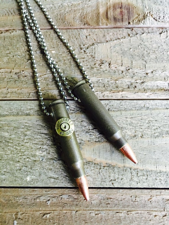 His And Hers Bullet Necklaces
 Couples bullet necklaces brass 223 REM his and hers bullet