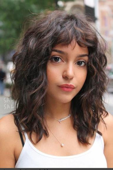 Long Curly Hairstyles With Bangs
 Proof That Curly Hair Girls Can Wear Bangs Too Southern