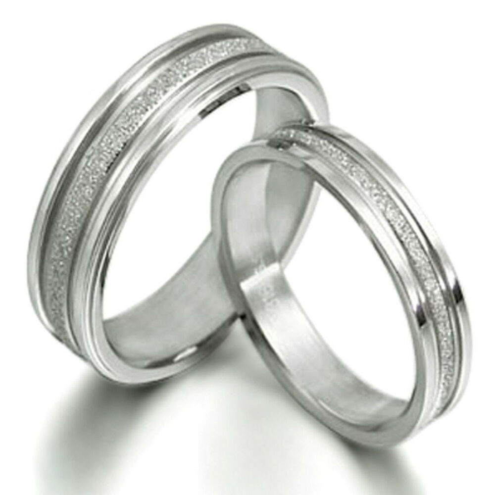Matching Wedding Ring Sets
 His and Her Matching Wedding Bands Titanium Ring Set 016A3
