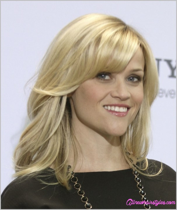 Medium Hairstyle Side Swept Bangs
 Medium length haircuts with side swept bangs and layers