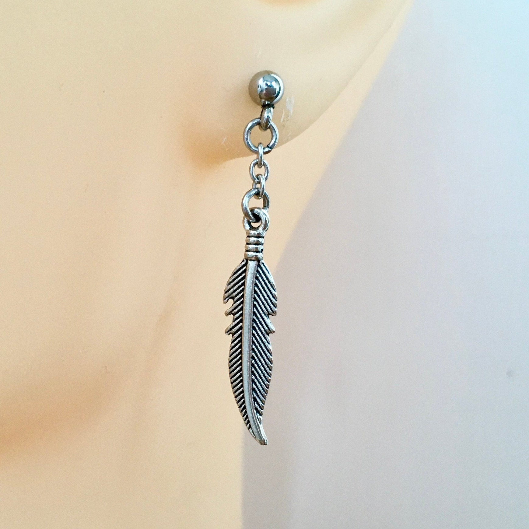 Mens Feather Earrings
 Feather dangle earring single earring or a pair of