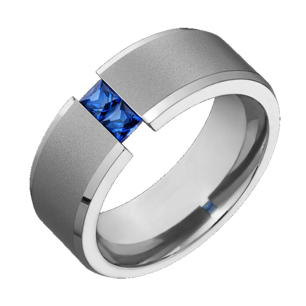 Mens Sapphire Wedding Rings
 Mens Titanium Wedding Band Blue Sapphire Tension Set