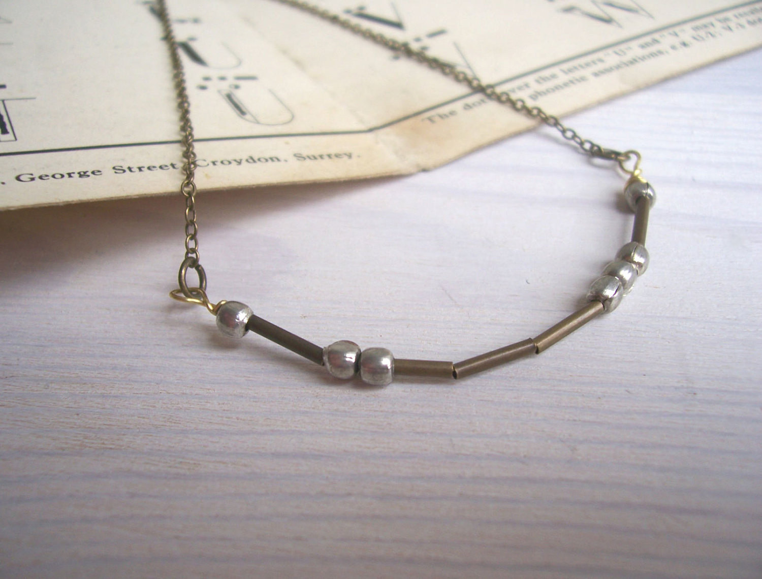 Morse Code Love Necklace
 Love Morse Code necklace mixed metals personalised message