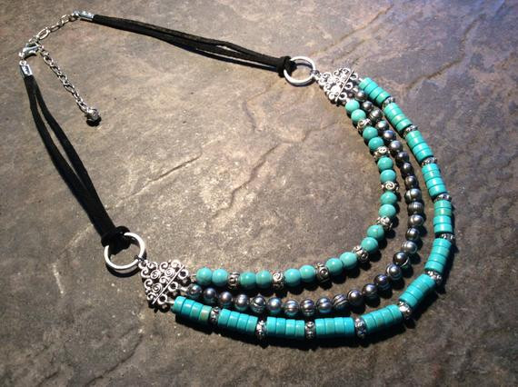 Multi Strand Necklace
 Turquoise Multi strand necklace with Leather Cord and