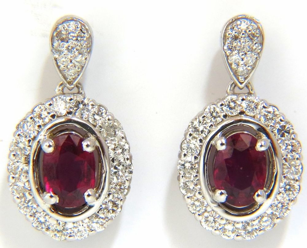 Natural Ruby Earrings
 $5000 2 96CT NATURAL OVAL BRIGHT PURPLE RED RUBY DIAMOND