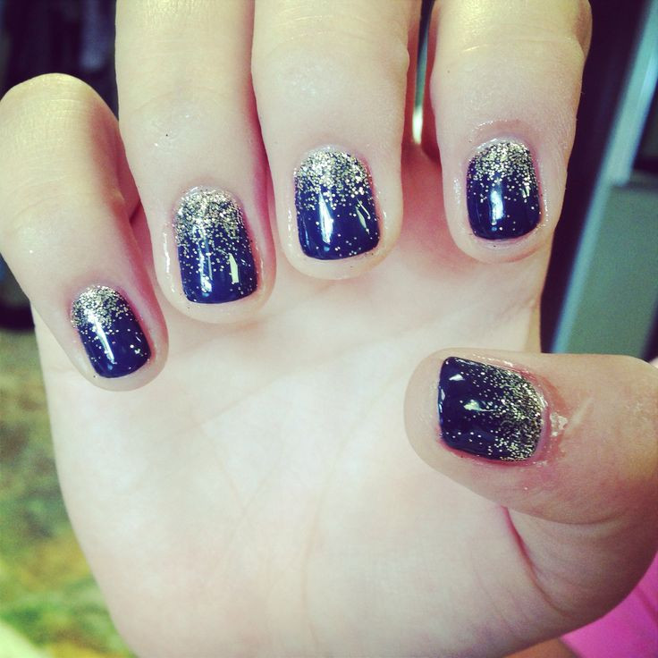 Navy Blue Glitter Nails
 Navy blue shellac with gold glitter
