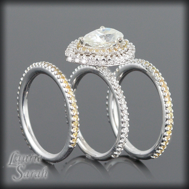 Pear Shaped Wedding Ring Sets
 Pear Shaped Moissanite Engagement Ring Wedding Set with Yellow